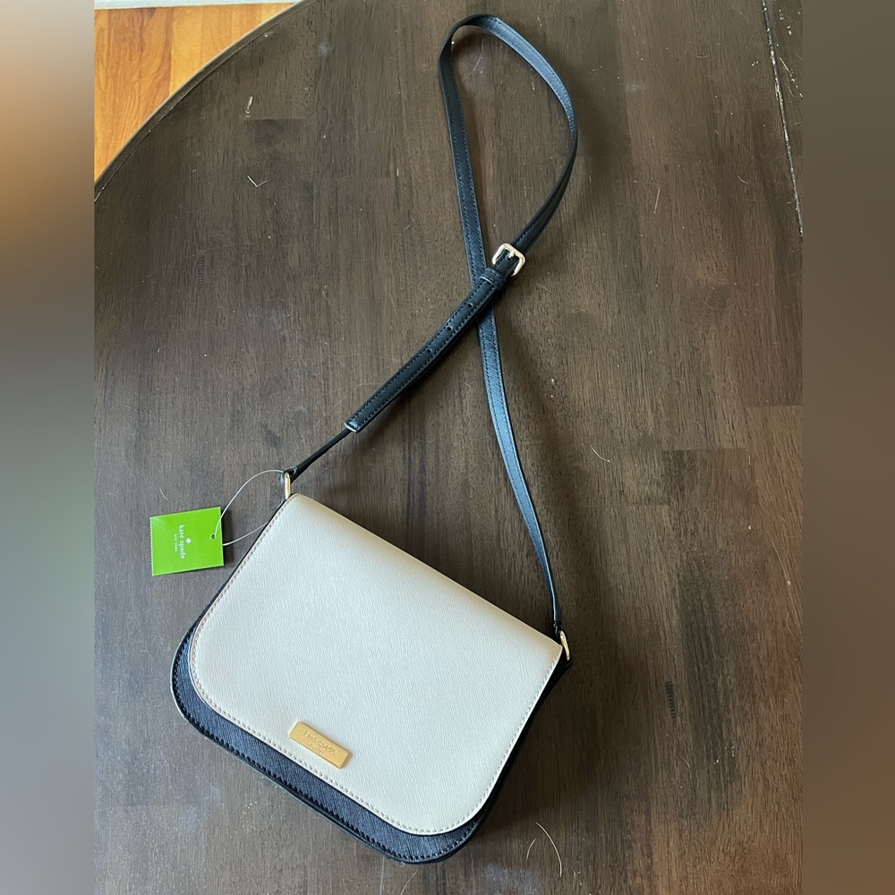 Kate Spade Cream and black purse never carried